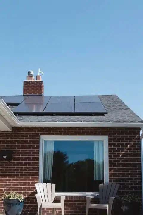 Energy-efficient solar heating panels fitted on rooftops in Wembley.